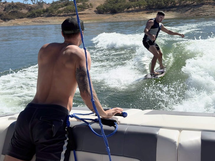 0909-Dylan-Zac-Efron-Boat-SUB