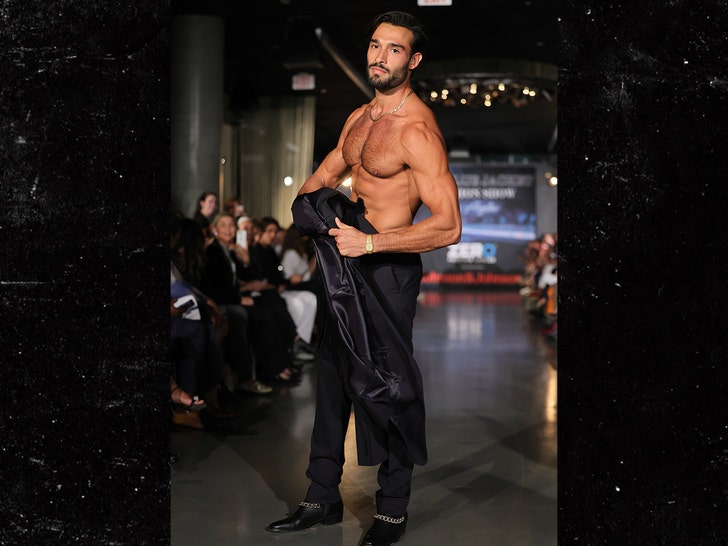 Sam Asghari walks the runway for the Blue Jacket Fashion Show getty 2