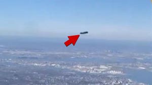 Woman Claims to Have Filmed Possible UFO From Airplane Above NYC