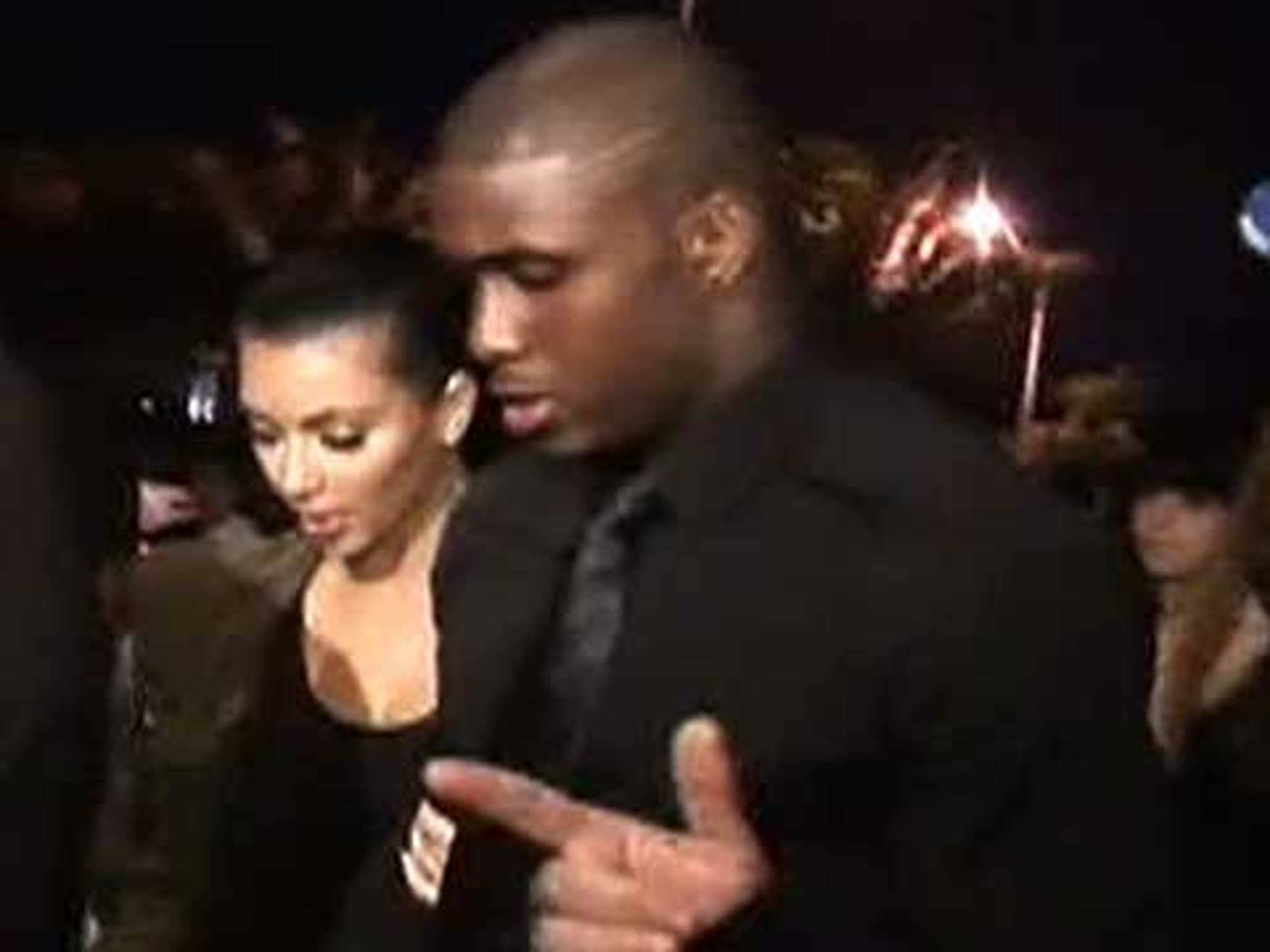 Super Bowl 2010: Kim Kardashian kisses Reggie Bush after New