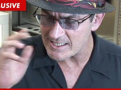 0219_charlie_sheen_tmz_EX