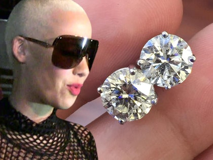 063016-amber-rose-earrings-tmz