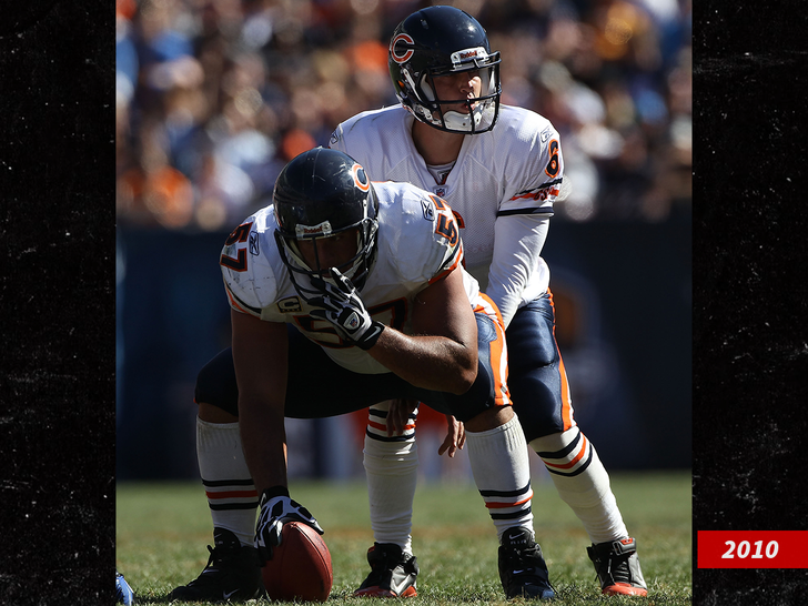 Jay Cutler #6 of the Chicago Bears calls play signals as teammate Olin Kreutz #57