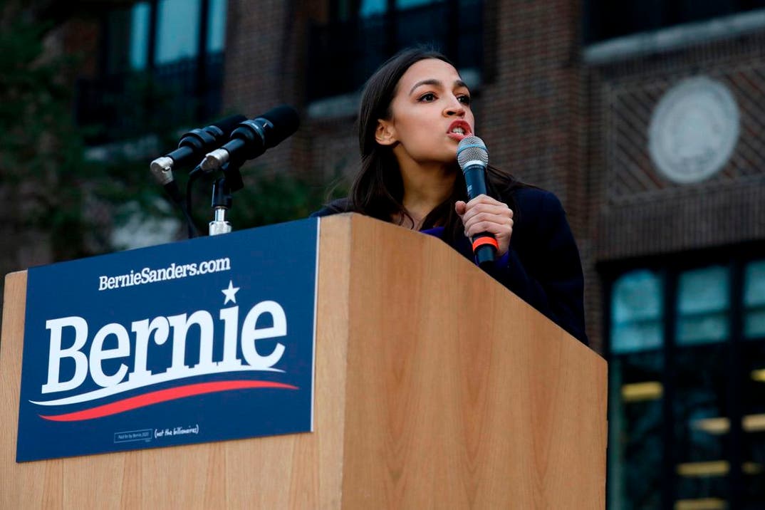 US Representative Alexandria Ocasio-Cortez speaks before Democratic presidential hopeful Vermont Senator Bernie Sanders addressed supporters during a campaign rally in the Diag at the University Michigan in Ann Arbor, Michigan, on March 8, 2020.
