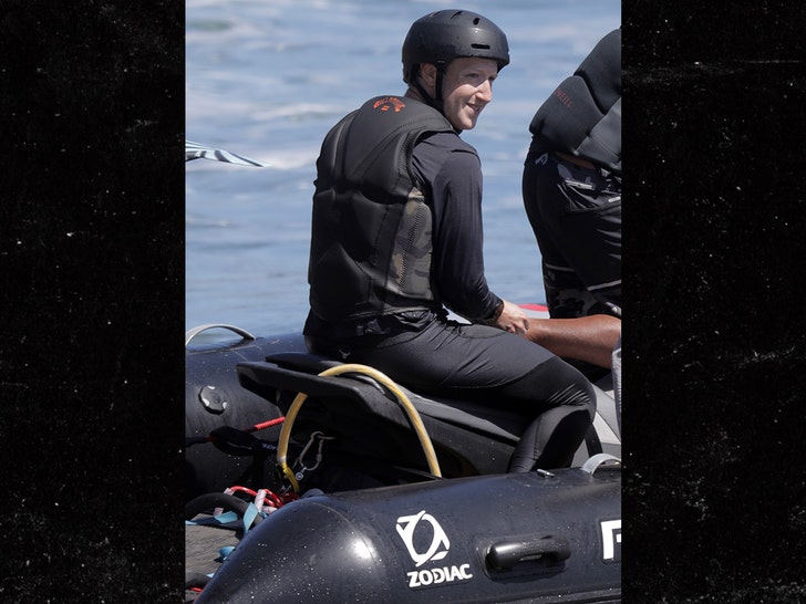Facebook CEO captured surfing with ankle bracelet that drives sharks away