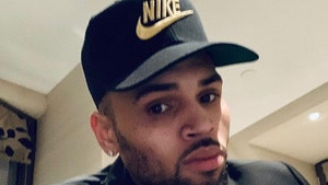 Chris Brown's Suspect in Battery Probe, Woman Claims He Smacked Weave Off