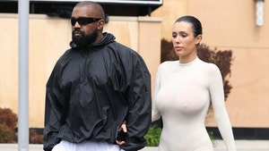 Bianca Censori in Revealing Outfit with Kanye West at Cheesecake Factory