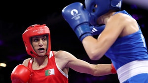 Imane Khelif of Team Algeria and Angela Carini of Team Italy boxing