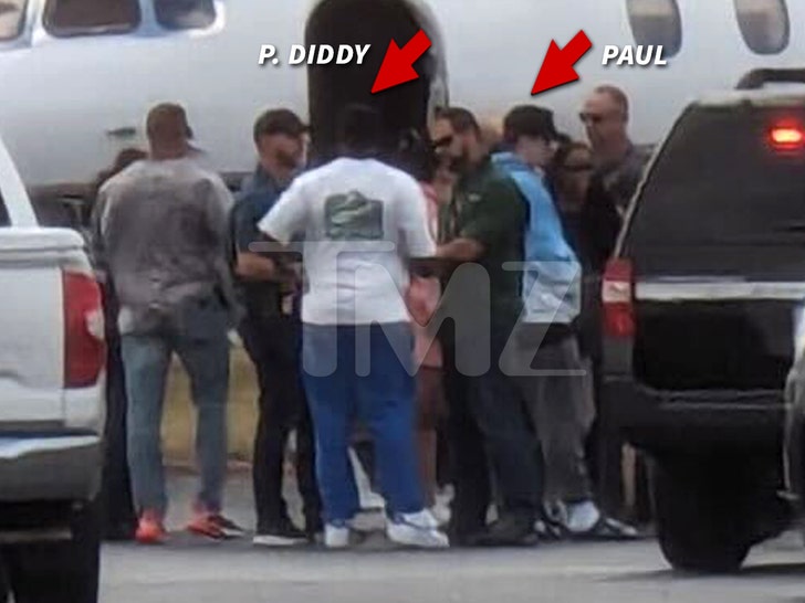 Photos of Diddy arguing with federal agents before his associate was arrested on drug charges surfaces