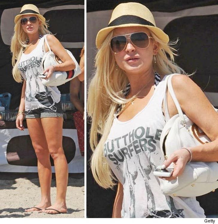 Lindsay Lohan -- Just Beachy :: 0722-lilo-oakley-wi-1-credit