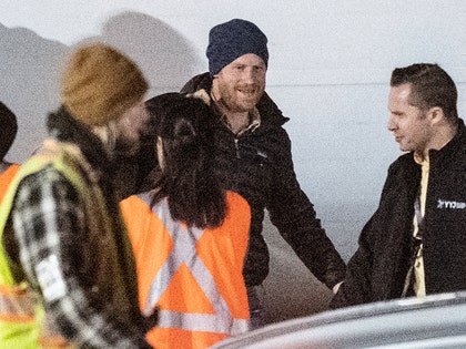 0121 Prince Harry arriving to canada Back