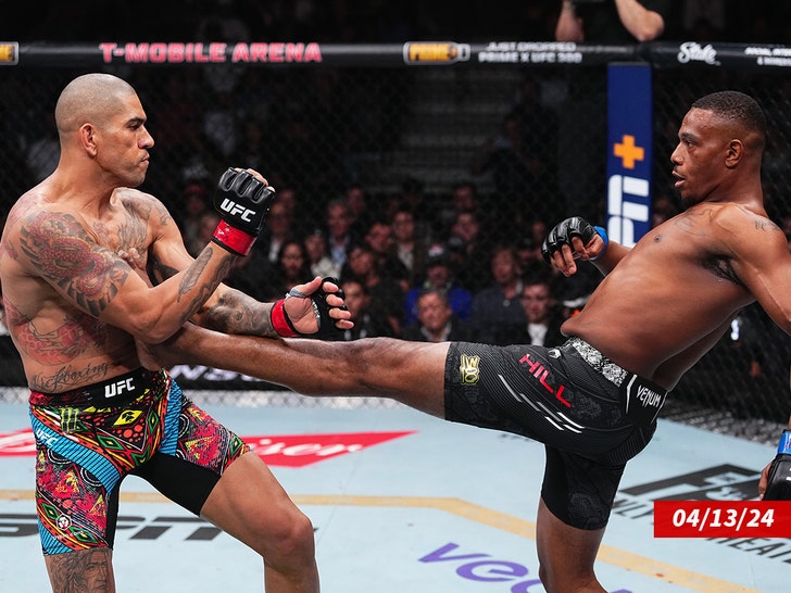 Jamahal Hill kicks Alex Pereira of Brazil getty