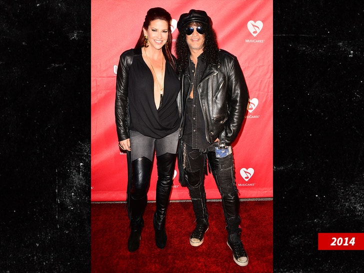 Slash and Perla Ferrar Getty 2
