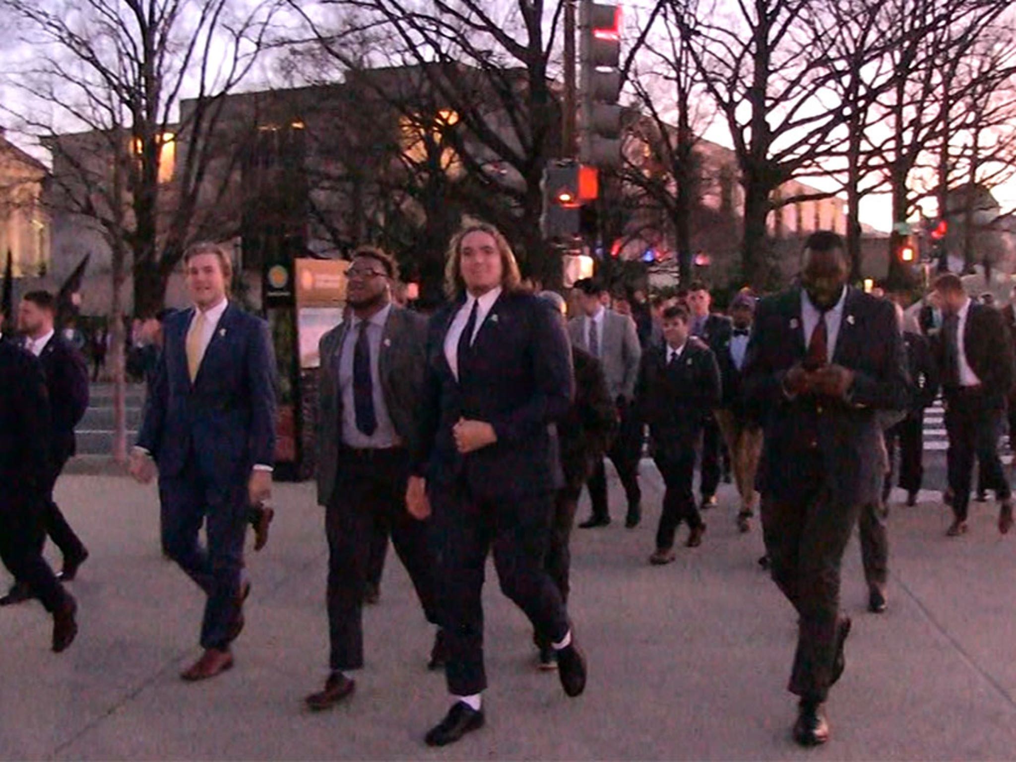 Joe burrow does the get the gat dance as he and his other Bengals teammates  celebrate division win 