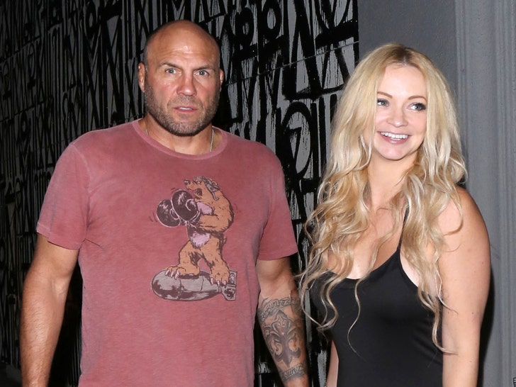 0908 randy couture mindy robinson getty 01