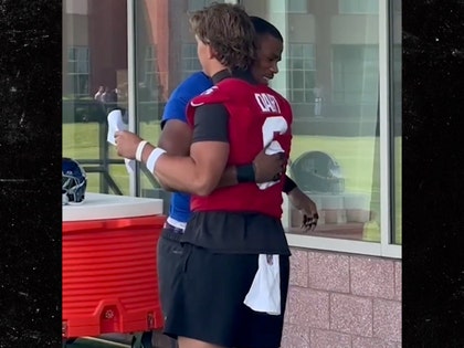 Jaxson Dart and Abdul Carter embrace x