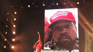 Nipsey Hussle Performs 'F*** Donald Trump' with Kanye's MAGA Photo
