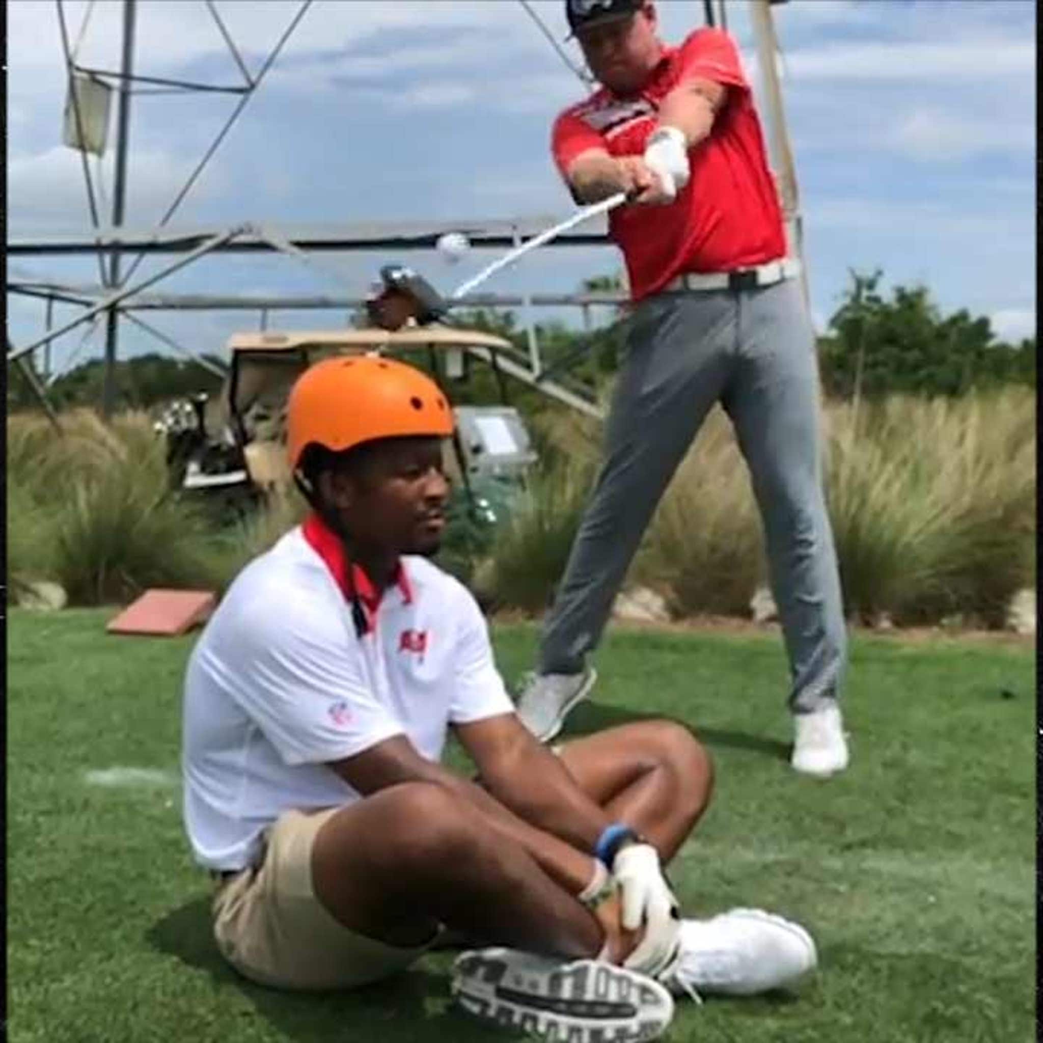 Tampa Bay Buccaneers' Jameis Winston lets trick shot golfer use his