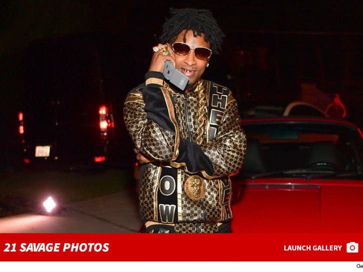 21 Savage's is all smiles in a Louis Vuitton Chargers fit — Attack