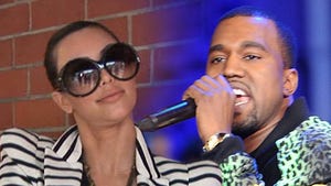 Kim Kardashian and Kanye West -- 100,000 Reasons He's No Absentee Dad