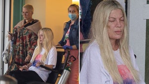 Tori Spelling Leaves Hospital With A Bruised Face After Mystery Health Concern