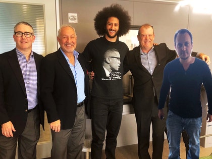 0216-colin-kaepernick-with-lawyers-twitter-01