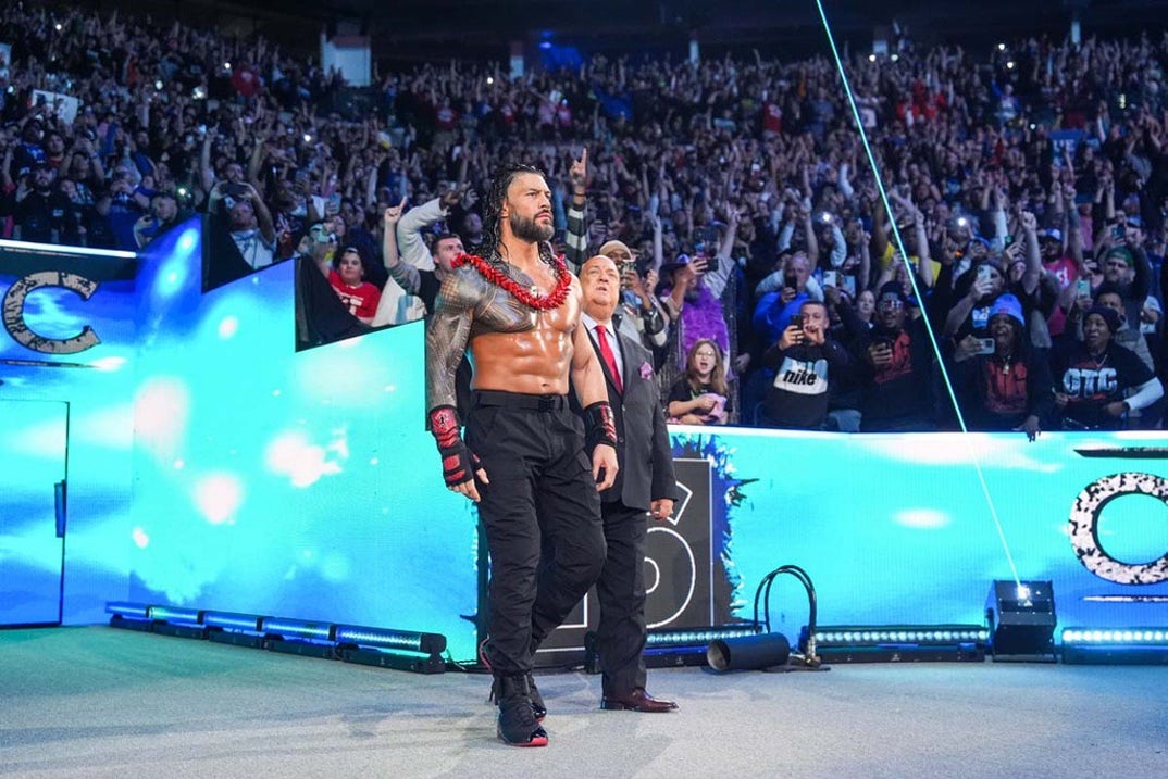Roman Reigns enters at #16 with his wiseman Paul Heyman.