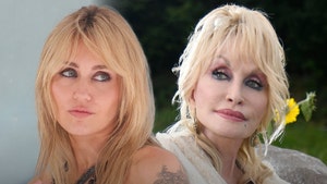 miley cyrus and dolly parton getty 2