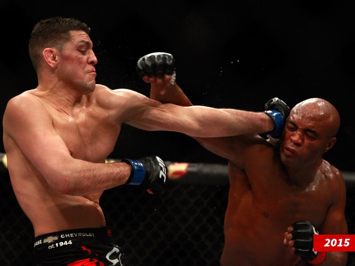 Nick Diaz punches Anderson Silva