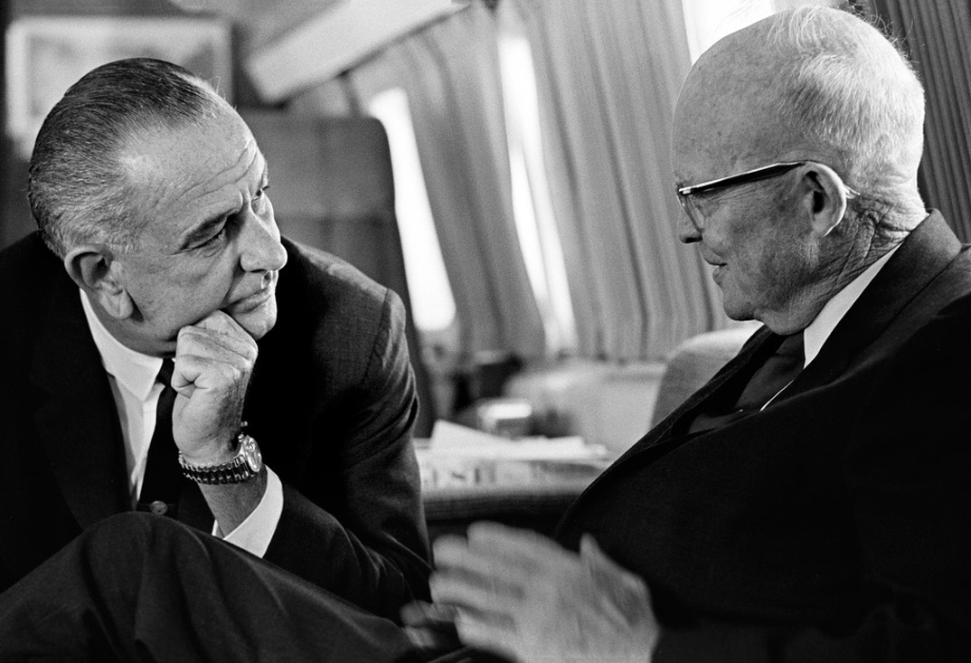 U.S. President Lyndon Johnson meeting with former U.S. President Dwight Eisenhower aboard Air Force One, Andrews Air Force Base, Maryland, USA, Yoichi Okamoto, October 5, 1965.