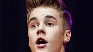 Justin Bieber -- SPITS IN MAN'S FACE ... Allegedly