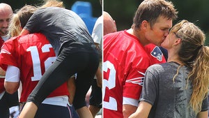 Tom Brady Smothered By Gisele at Patriots Practice