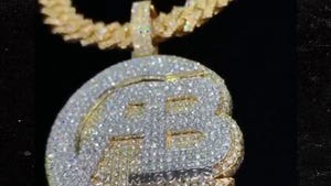 Antonio Brown Cops 97 Carat Diamond Pendant & Chain Featuring Record Label Logo