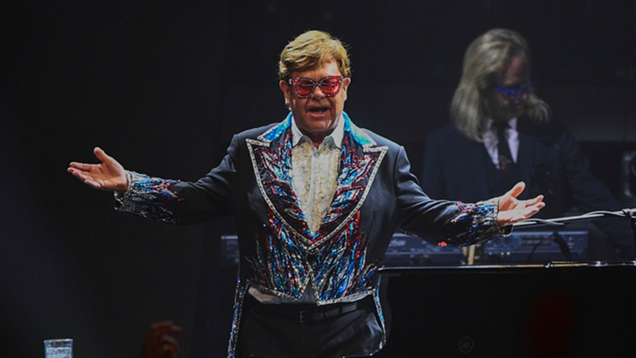 Elton John performs "Goodbye Yellow Brick Road", the last concert of the farewell tour