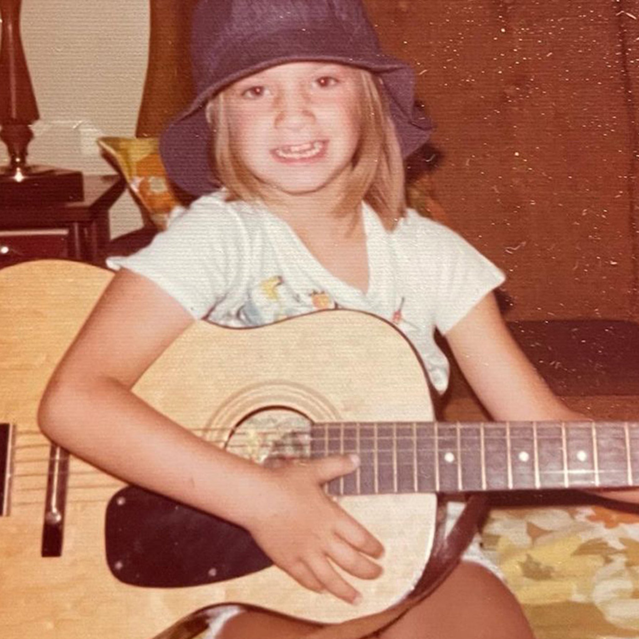 Guess Who This Mini Guitarist Turned Into! - TMZ (Picture 2)
