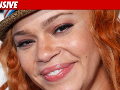 0821_faith_evans_getty_ex