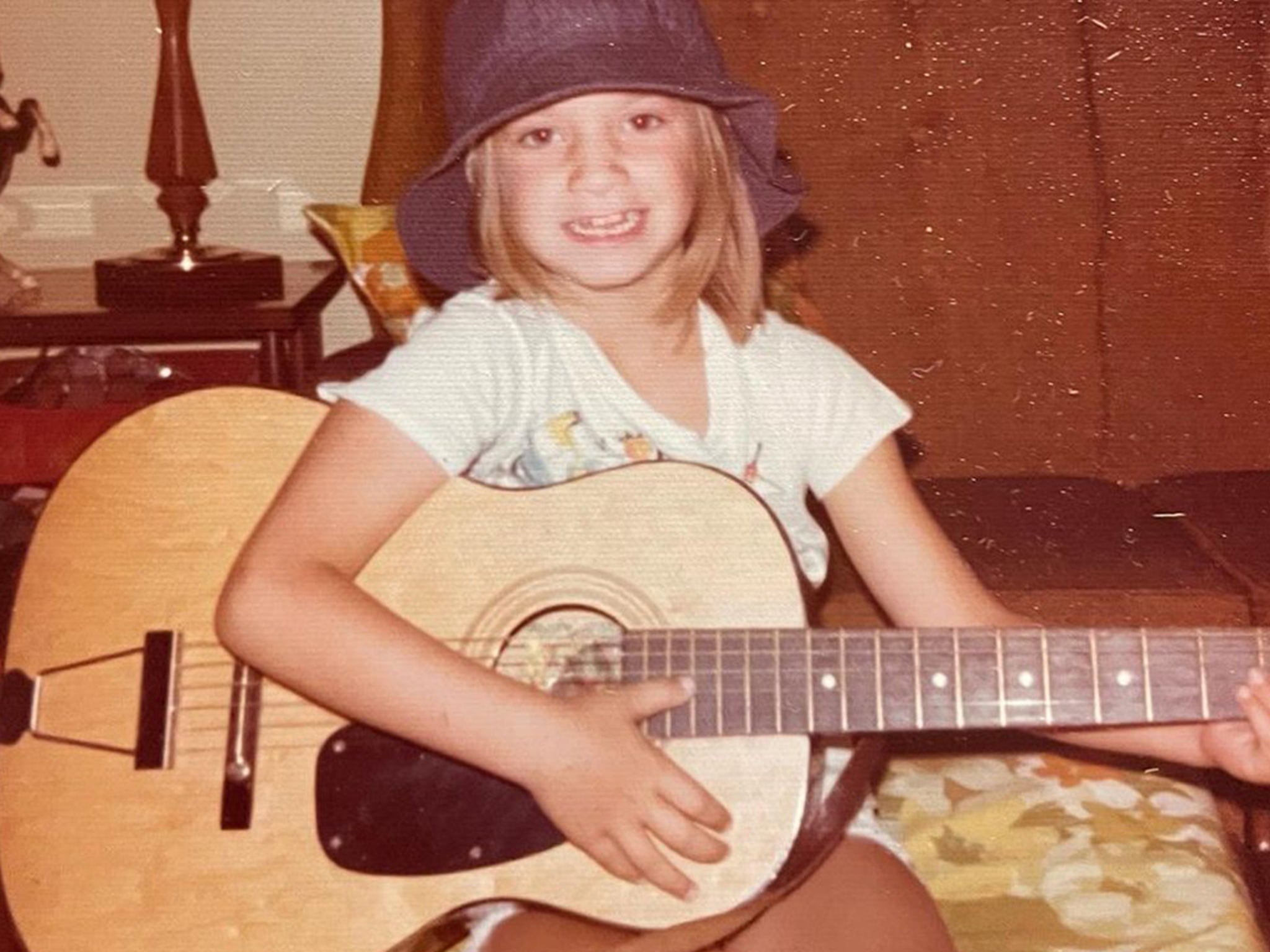 Guess Who This Mini Guitarist Turned Into! - TMZ (Picture 1)