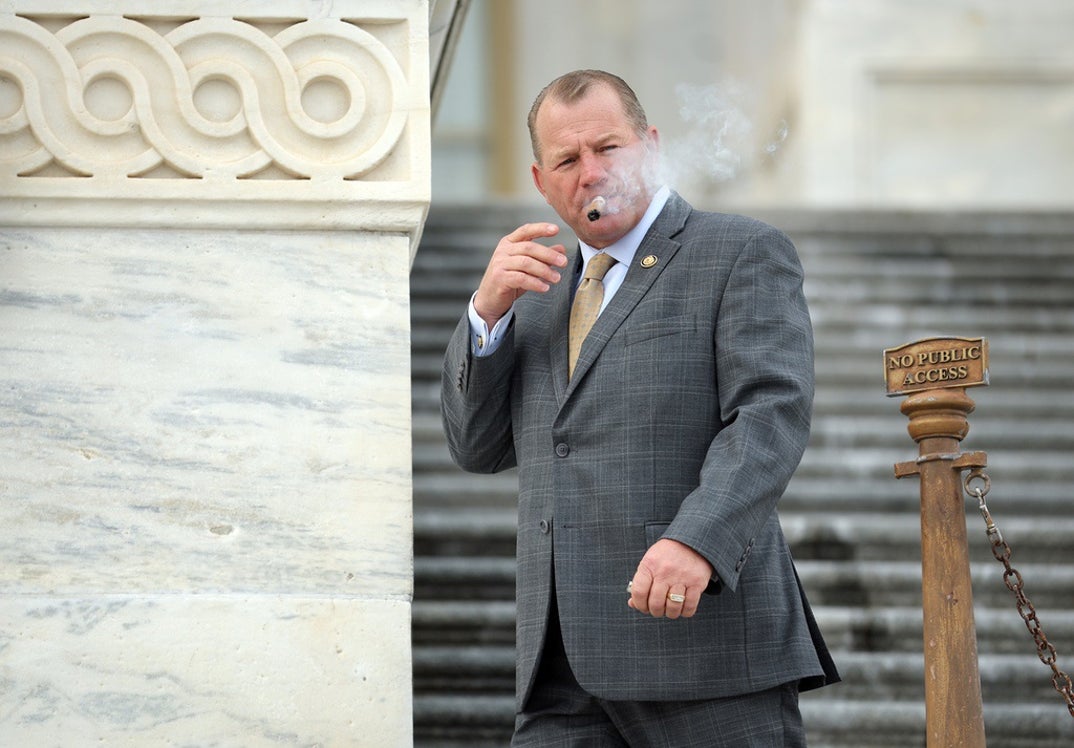 Representative Troy Nehls Smoking Cigars 9