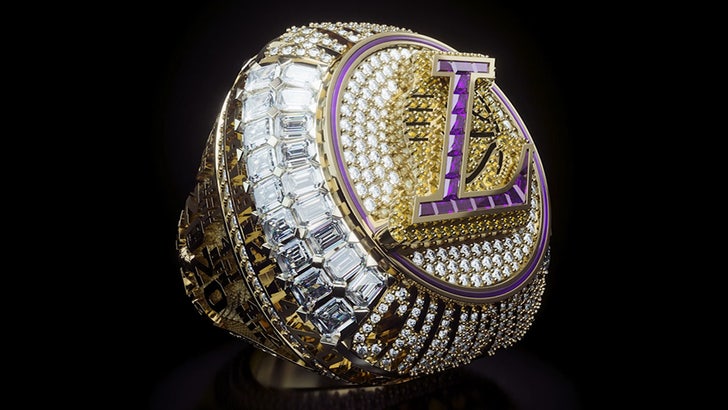 Kobe Bryant with Replica Lakers Championship Rings and