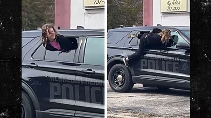 033126 woman cop car kal