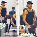 Sam Asghari grabs his girlfriend's hips