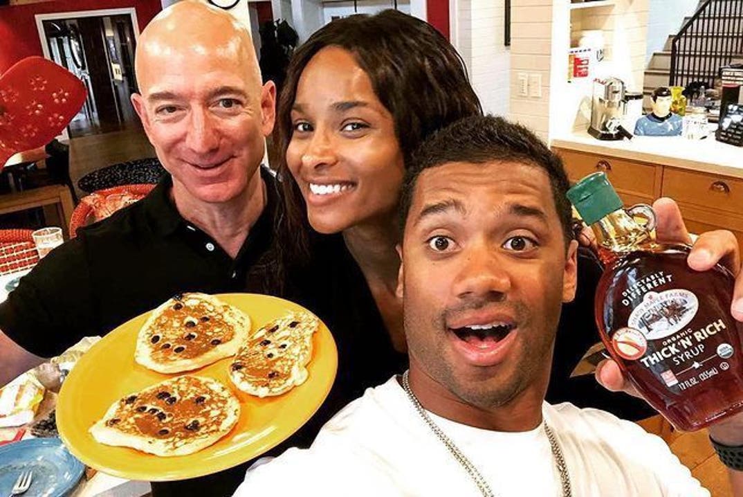 Jeff Bezos, Ciara, and Russell Wilson