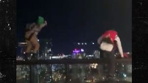 BASE Jumpers Leap from Nashville Hotel Roof Bar, Parachute Down