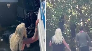 Dog the Bounty Hunter Wades Through Swampy Waters in Search for Brian Laundrie