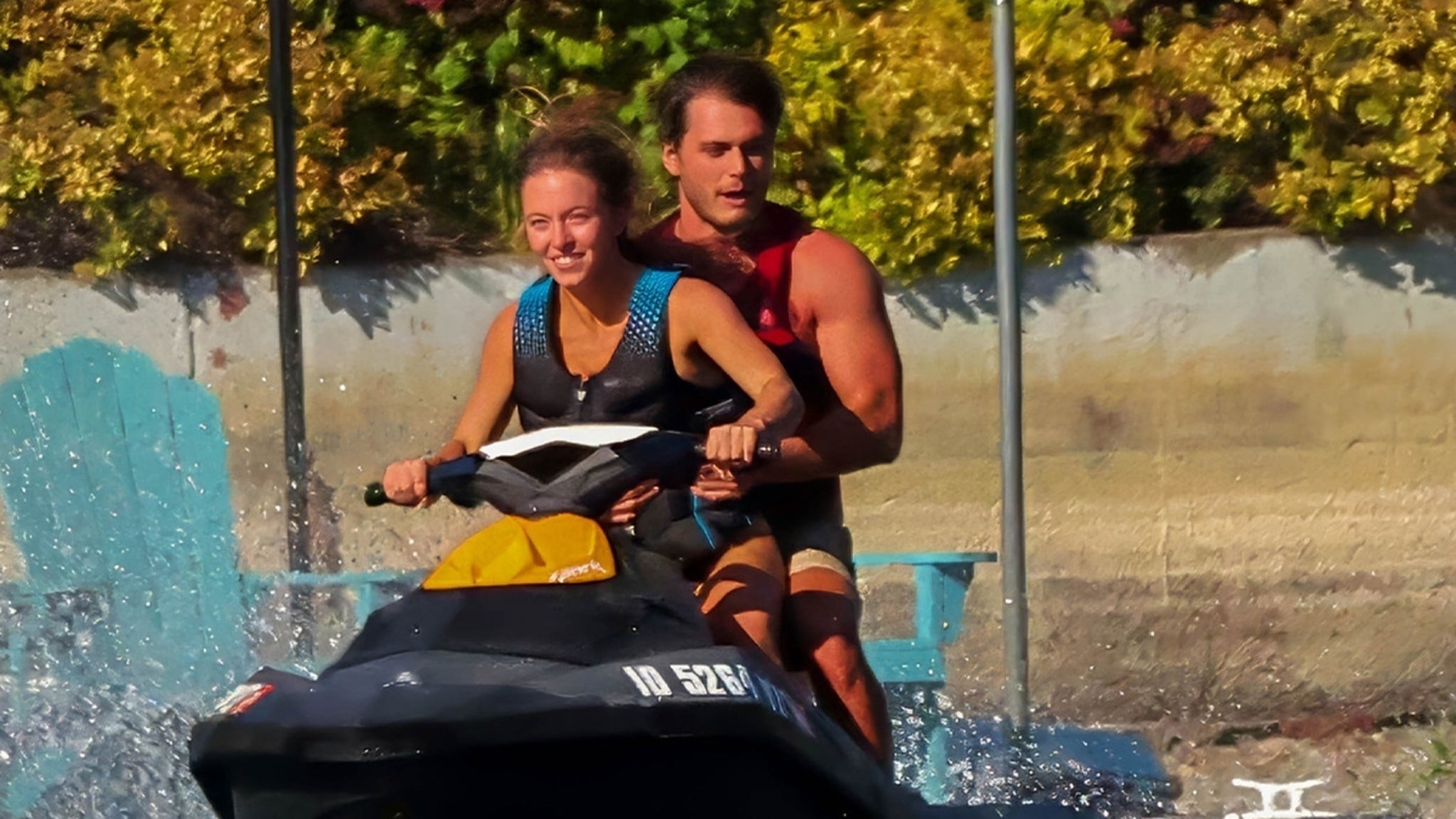 Sydney Sweeney Rides Jet Ski on Lake With Mystery Man Wrapped Around Her
