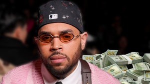 chris brown pays Housekeeper getty comp