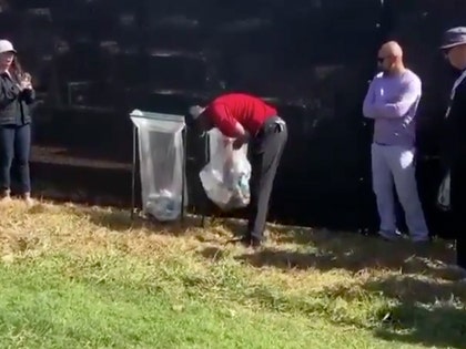 0217 tiger woods trash ball twitter