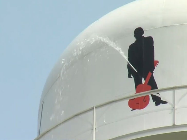 Johnny Cash Silhouette on Water Tower Shot, Singer Appears to be Pissing.jpg