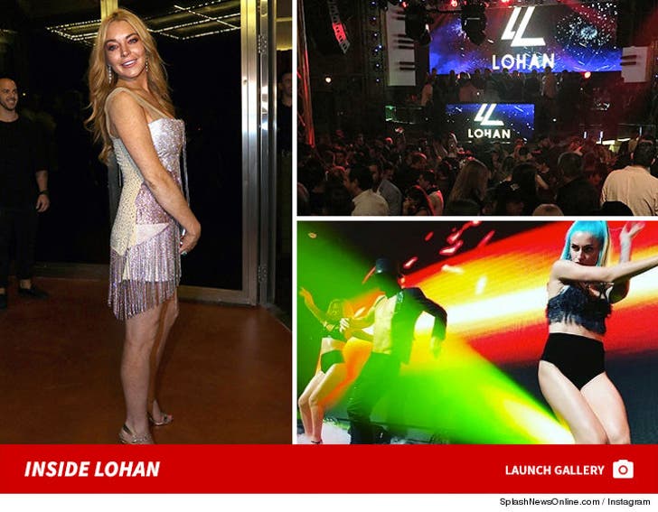 Lindsay Lohan -- I Will Rule the World With Spas :: 1016-lindsay-lohan-new-club-gallery-launch-splash-instagram-4