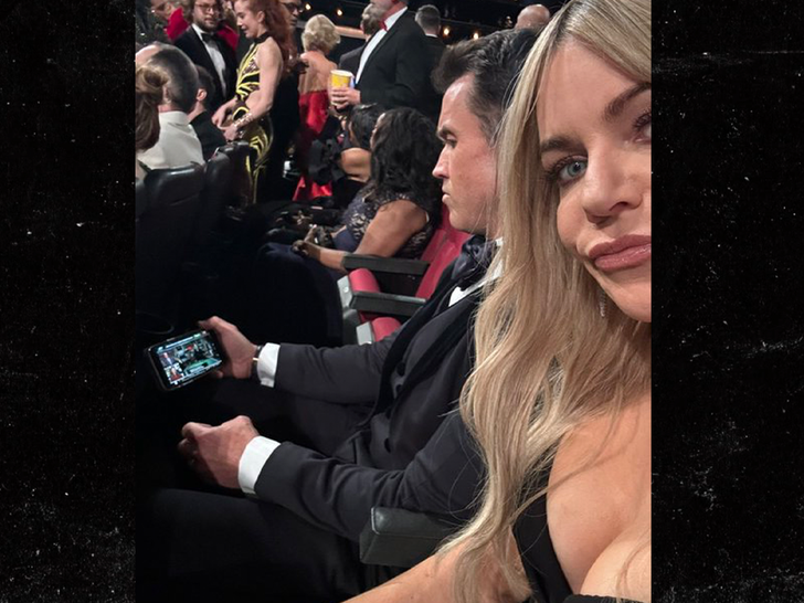 rob mcelhenney watching eagles game at emmys